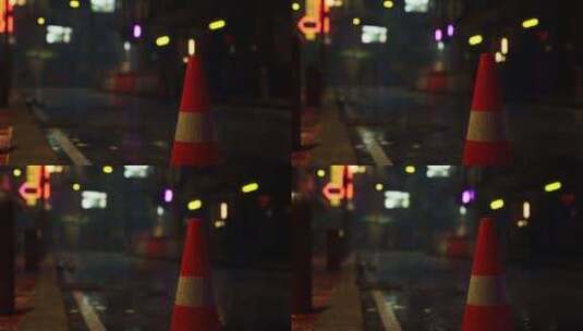 多雨的亚洲城市路边明亮的交通锥高清在线视频素材下载