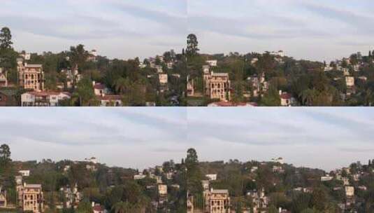 空中展示好莱坞山住宅区，背景是格里菲斯天高清在线视频素材下载