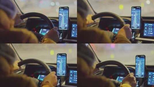 男子在城市街道夜景中驾驶车流并用手机导航高清在线视频素材下载