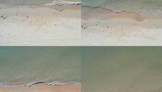 航拍海南三亚湾海边沙滩度假人群高清在线视频素材下载
