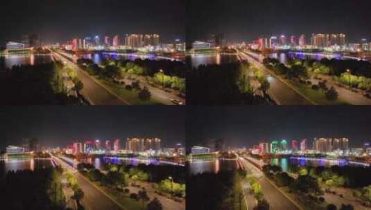 航拍扬州西区-京华城商圈、明月湖公园夜景高清在线视频素材下载