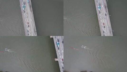 桥梁下的龙舟航拍高清在线视频素材下载
