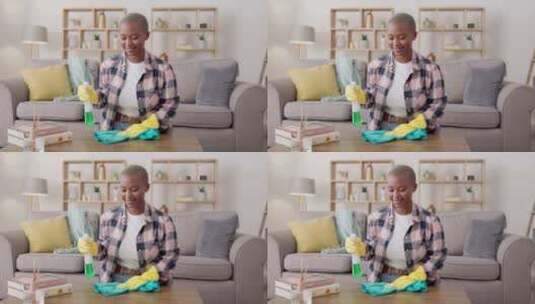一个女人打扫客厅做家务和家务的擦拭、桌子高清在线视频素材下载