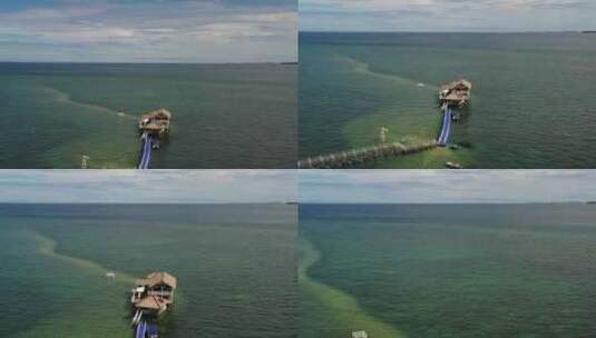 大海快艇海岛码头海滩马来西亚蓝色海上水屋高清在线视频素材下载