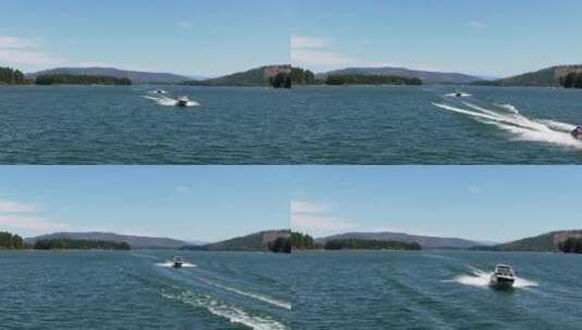 在湖面上的滑行的两艘快艇高清在线视频素材下载