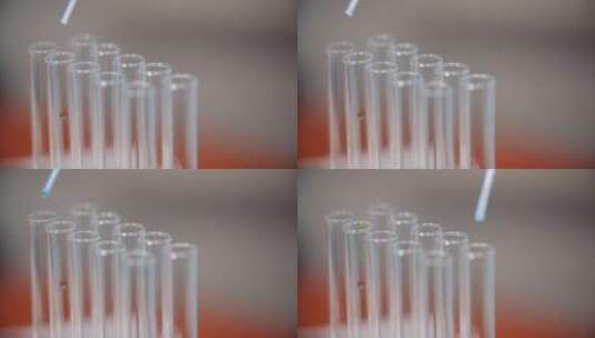 科学家使用移液管把试剂滴在试管里高清在线视频素材下载