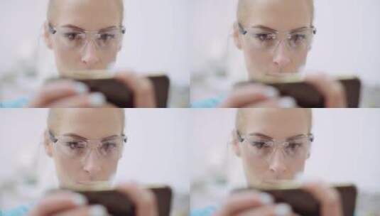 在诊所使用手机的女医生高清在线视频素材下载