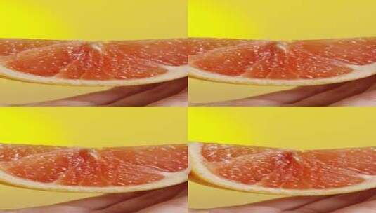 2K竖屏高速摄影一片橙子挤出橙汁高清在线视频素材下载
