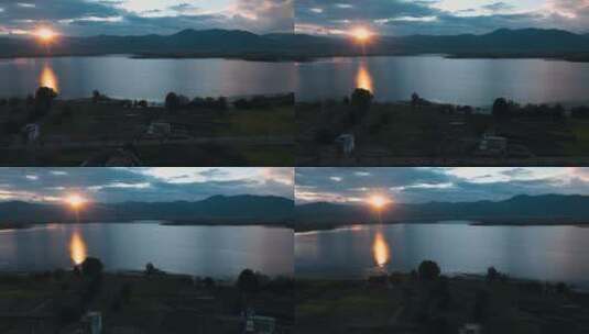 4k夕阳湖泊视频阳里晚霞的高原湖泊高清在线视频素材下载