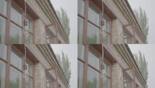 索尼A7S3屋檐落雨前后景改变高清在线视频素材下载
