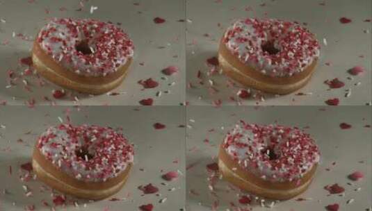 甜甜圈装饰在弹跳中落下高清在线视频素材下载