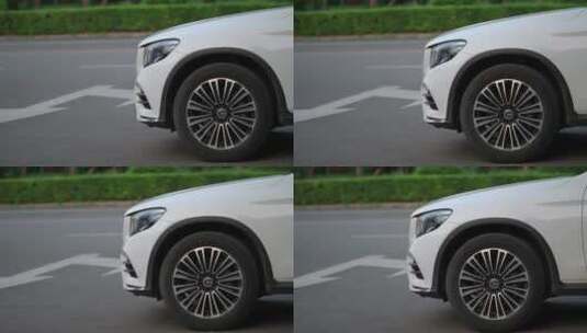 白色的奔驰GLC车头侧面高清在线视频素材下载