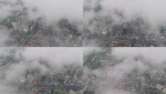 高空航拍云海中俯瞰城市建筑高清在线视频素材下载