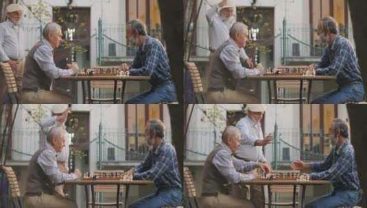 退休老人围着桌子下国际象棋 高清在线视频素材下载