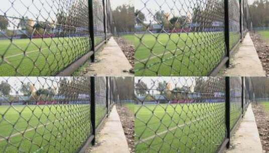 足球场外的金属网围栏高清在线视频素材下载