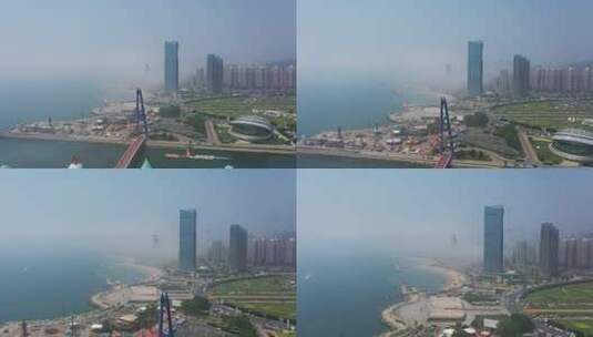 航拍大连云雾下的星海城市广场高清在线视频素材下载
