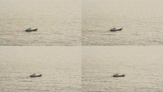 海上漂泊着一只孤独的小渔船高清在线视频素材下载