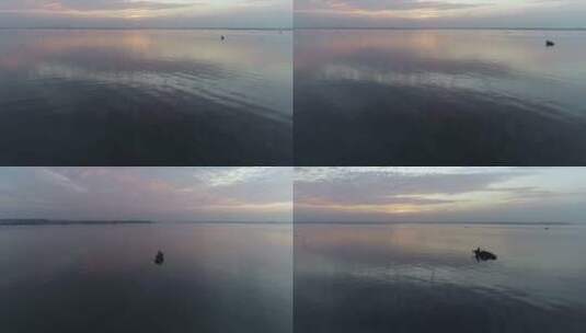 苏州阳澄湖航拍清晨水面渔船泛舟大远景高清在线视频素材下载