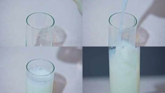 牛奶羊奶倒出倒进杯中高清在线视频素材下载