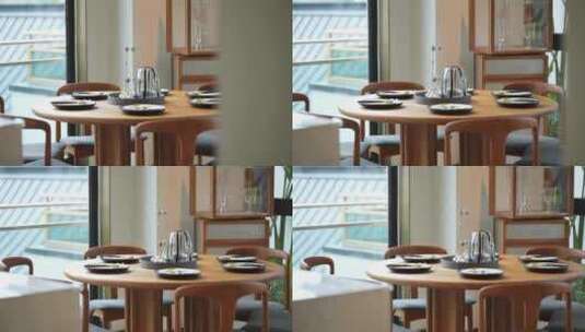 別墅内餐厅圆形餐桌餐具高清在线视频素材下载