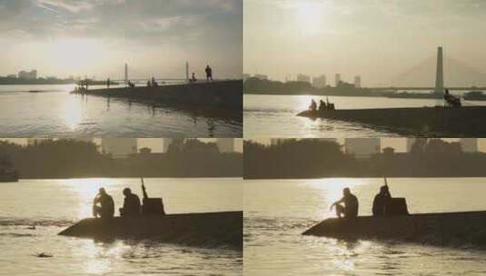 佛山夕阳西下河岸边钓鱼的人高清在线视频素材下载