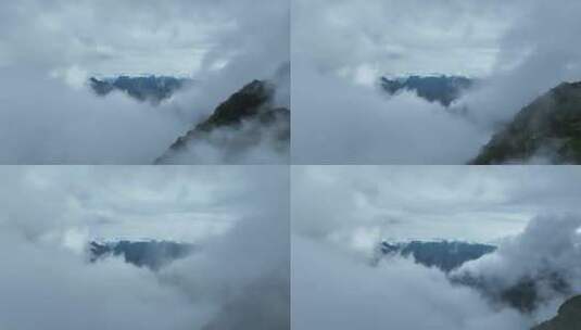 航拍云雾中飞行的无人机仙山云海来宾圣堂山高清在线视频素材下载