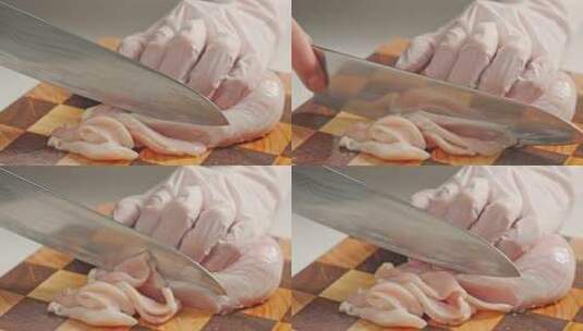 厨师用刀切鸡胸肉鸡肉特写高清在线视频素材下载