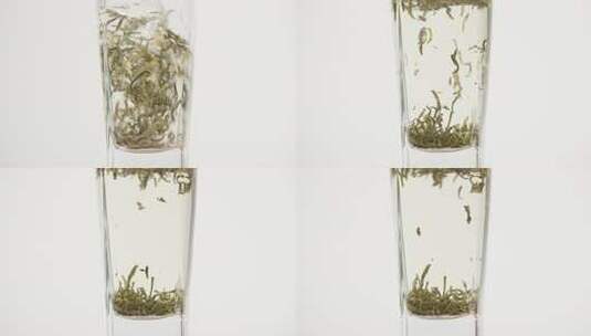 玻璃杯中的绿茶冲泡特写高清在线视频素材下载