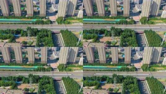 中国辽宁沈阳航拍高铁在城市中行驶高清在线视频素材下载