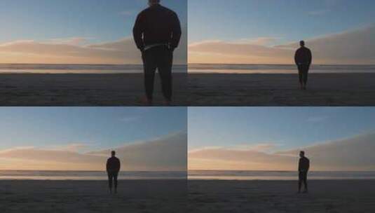独自走在海滩上的男人高清在线视频素材下载