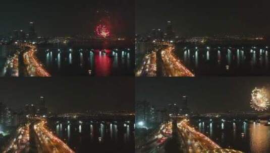 城市夜晚的河上烟花表演高清在线视频素材下载