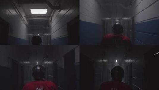 曲棍球球员走在走廊里高清在线视频素材下载