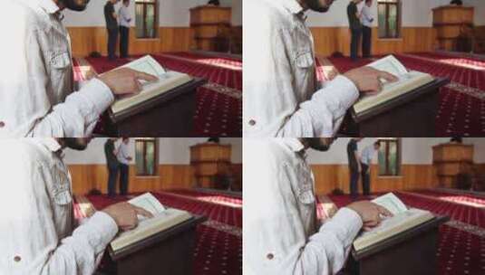 年轻的穆斯林男子在清真寺阅读古兰经高清在线视频素材下载