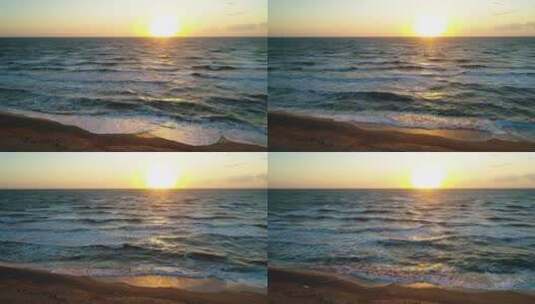 日落时海滩上的海浪高清在线视频素材下载