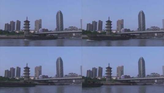 旅游景区 外秦淮河 塔 城市大楼 桥下过船高清在线视频素材下载