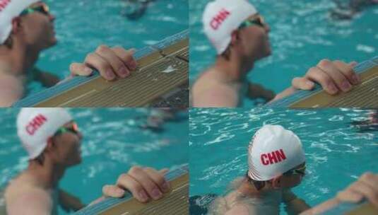 男运动员在泳池边用手把着高清在线视频素材下载