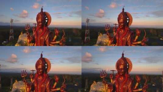 夕阳下雄伟的印度神像高清在线视频素材下载