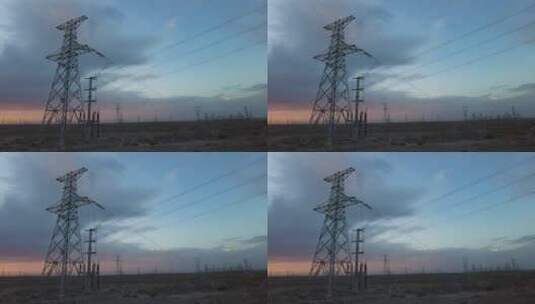 风中荒野高压电塔高清在线视频素材下载