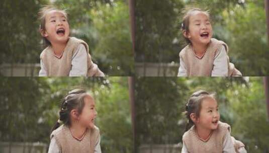 阳光公园里开心快乐的小女孩微笑高清在线视频素材下载