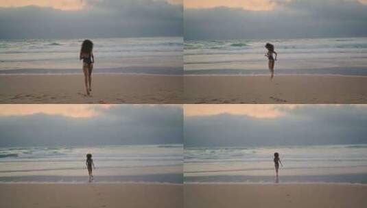 背影女人跑向海浪远处的夏夜高清在线视频素材下载
