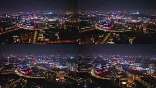 航拍扬州西区明月湖大桥夜景京华城商圈全景高清在线视频素材下载