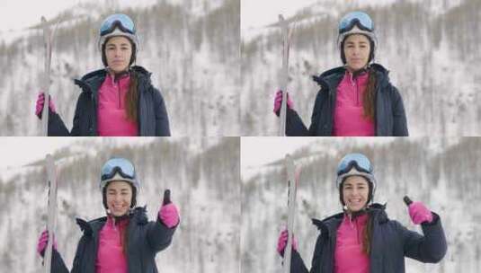 一个微笑的滑雪者在山里度假的肖像，在她身高清在线视频素材下载