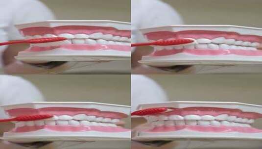 化妆牙科活动用红色牙刷刷模特牙齿高清在线视频素材下载