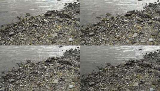 岩石海岸上的鹅卵石高清在线视频素材下载