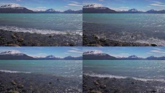 白雪覆盖的山峰和湖水高清在线视频素材下载