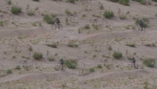 在沙漠中骑行的骑行者高清在线视频素材下载