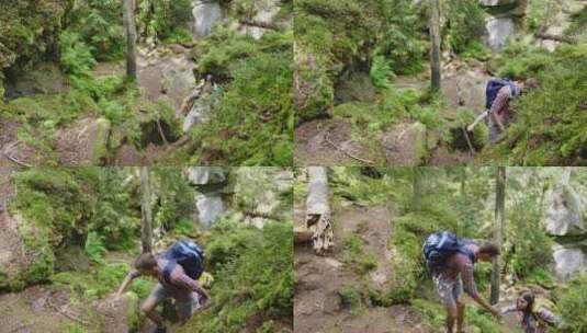男人帮助女人爬上陡峭的小路徒步旅行高清在线视频素材下载