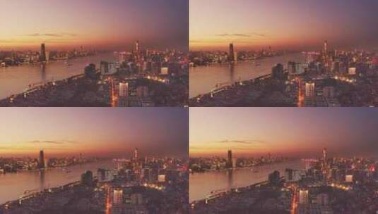 航拍夕阳下武汉长江大桥和现代城市风光高清在线视频素材下载