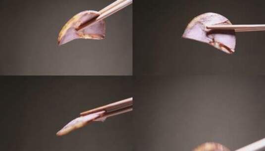 【镜头合集】筷子夹起一片熟食卤肉  (2)高清在线视频素材下载