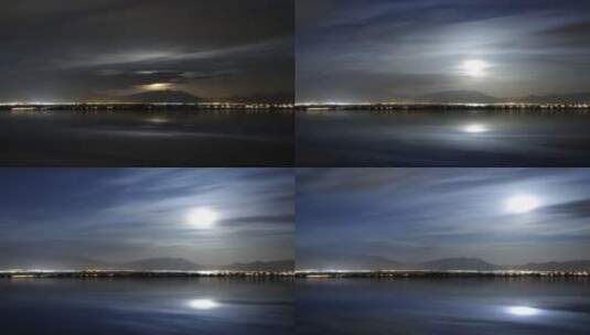 延时拍摄 夜晚大海城市上空飘动的白云高清在线视频素材下载